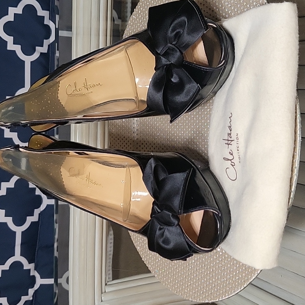Cole Haan Collection. Sz 10.5 Black patent w satin bows which have patent tips.
